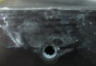 Aluminum anodize failure because of acid