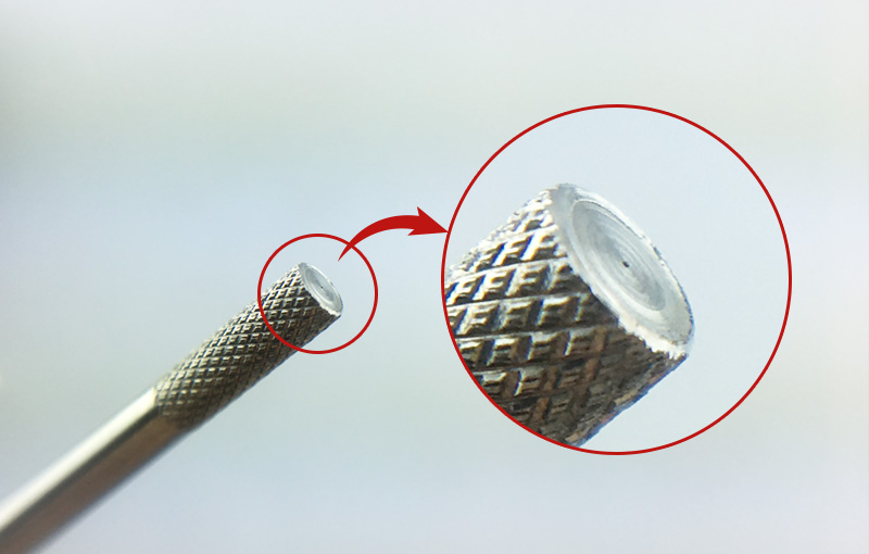 Plastic deformation after diamond knurling at one end 