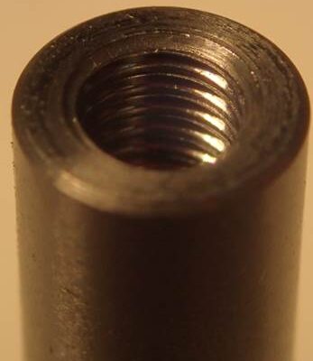 Thread machined by using fluteless tap