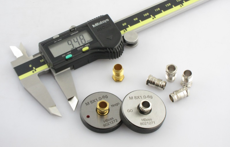 To use NO GO of the standard thread gauge for the inspection criterion for threads before plating. After plating, the threads have to pass the standard thread gauge inspections.