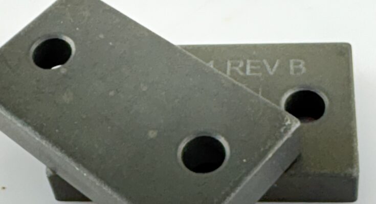 Flat bar made by Powder Metallurgy with letter engraving and black oxide finish